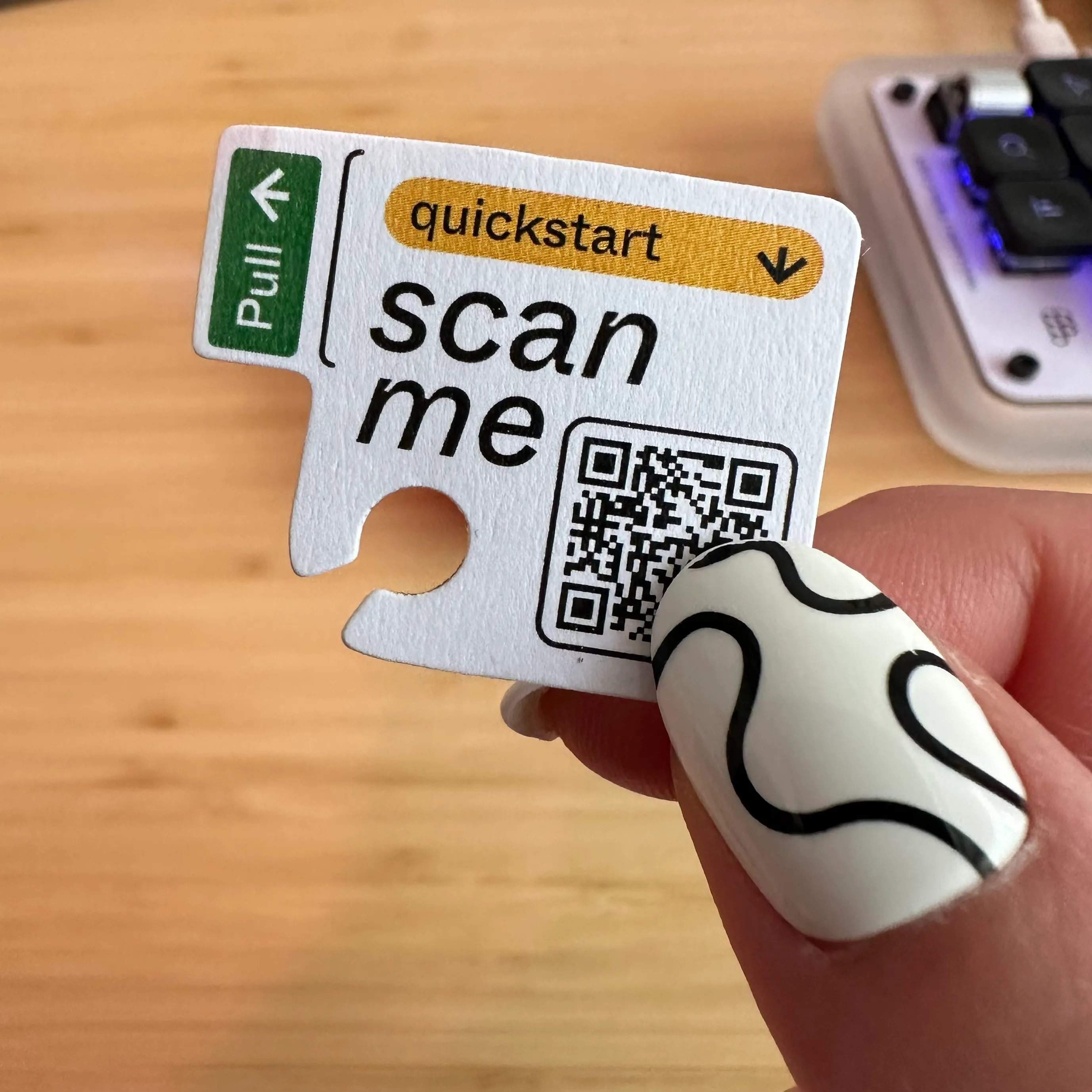 Close up of a small tag with a QR code